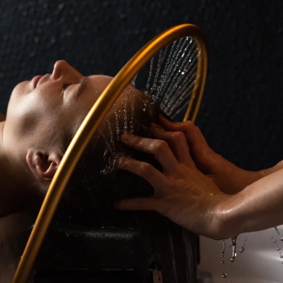 Woman receiving a relaxing Swedish back massage at Divine Lotus massage in Wolverhampton