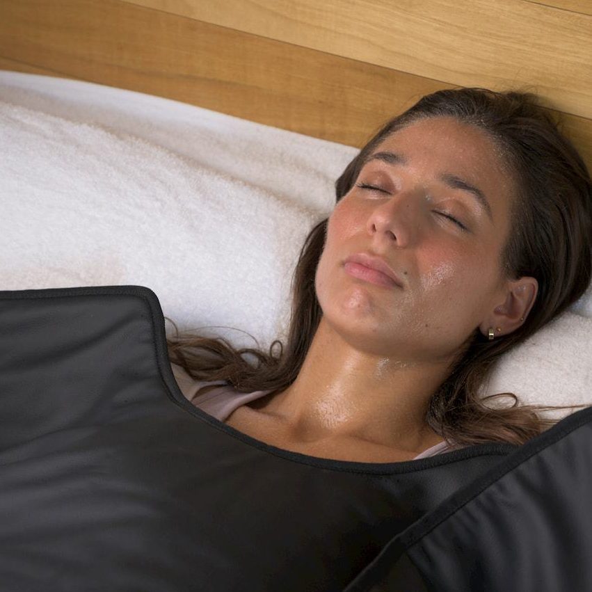 Woman receiving a relaxing Swedish back massage at Divine Lotus massage in Wolverhampton