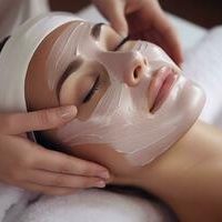 Client receiving a luxury facial treatment at Divine Lotus salon in Wolverhampton.