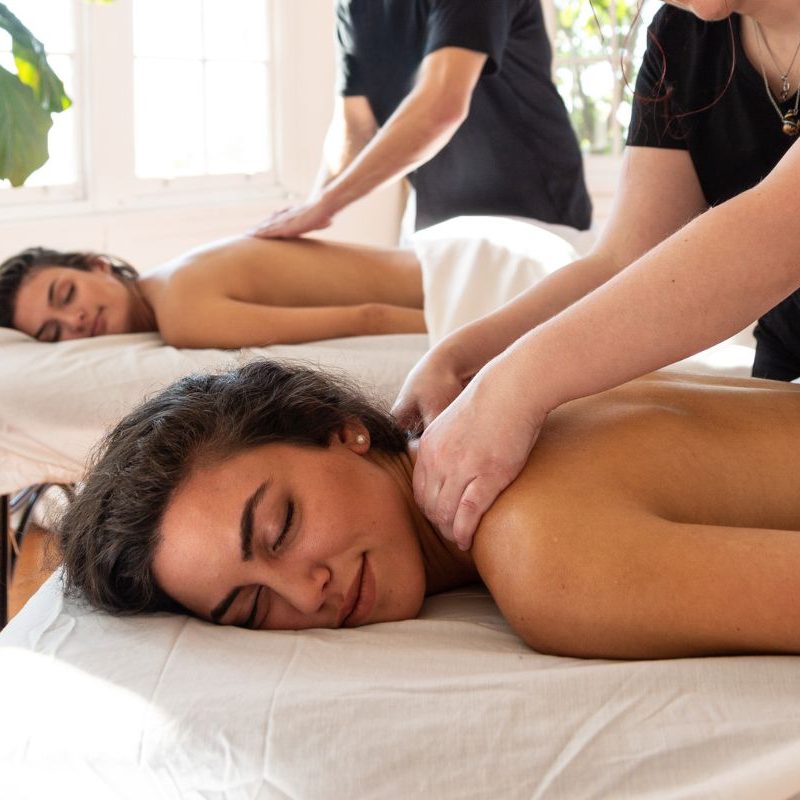 Woman receiving a relaxing Swedish back massage at Divine Lotus massage in Wolverhampton